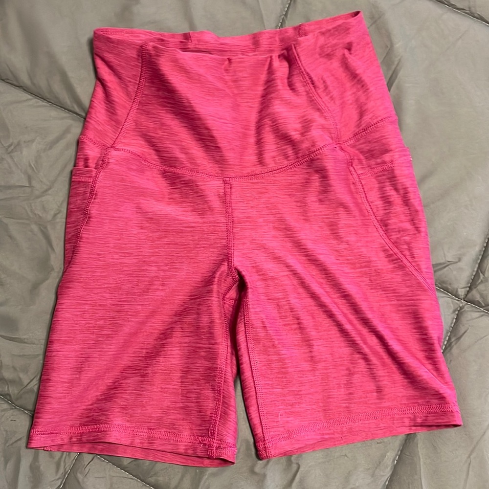 Pink biker shorts with pockets